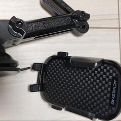 スマホホルダー 車 吸盤 回転可能 車載ホルダー自由調節　エアコン送風口用のと吸盤用のと2個セット


の画像