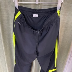 NIKEナイキ ボトムス ボトムス ウーブンPT サイドライン トラックパンツの画像