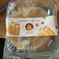 犬のケーキとおせちの画像