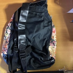 新品タグ付きミニリュックの画像