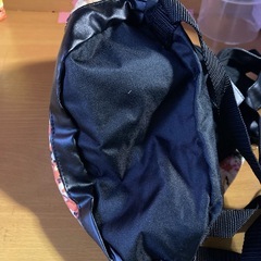 新品タグ付きミニリュックの画像