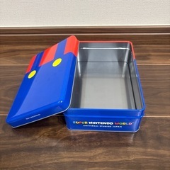 《8月24日迄》ユニバのニンテンドーワールドの缶ケース、マリオの画像