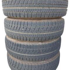 日産 マーチ(CBA−AK12)純正14㌅スチールホイールとスタッドレスタイヤ(BRIDGESTONE BLIZZAK VRX)の4本セットの画像