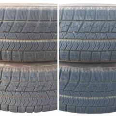 日産 マーチ(CBA−AK12)純正14㌅スチールホイールとスタッドレスタイヤ(BRIDGESTONE BLIZZAK VRX)の4本セットの画像