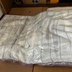ニトリの寝具、毛布、布団圧縮袋のセットの画像