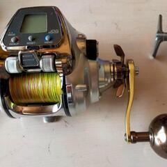 釣り用具　電動リ〜ルと竿と糸の画像