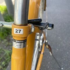 自転車　No.397　オレンジ　シティサイクル　27インチ　※前後振れあり 【リサイクルショップどりーむ荒田店】の画像