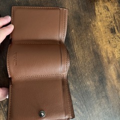 coach ミニ財布の画像