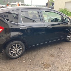 コミコミ28万円！！フィット！新規車検2年付！4WD！ワンセグTVナビ！の画像