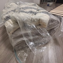 自転車、ベッドフレーム、布団の画像