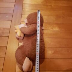 眠るおさるのジョージ人形　ジャンク品の画像