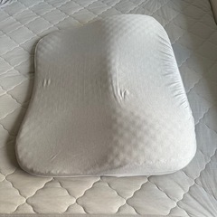 ニトリの枕+カバーの画像