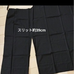 アメリカン フォーク アート ミュージアム 黒エプロンの画像
