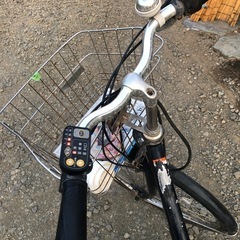 ヤマハ電動自転車近くの人は配達をします￼の画像
