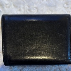 COACH 黒のレザー三つ折り財布の画像