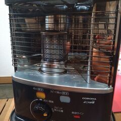 コロナ石油ストーブとポリタンク３本の画像