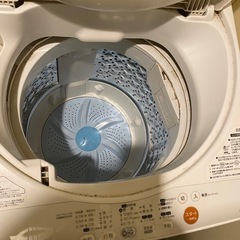 冷蔵庫と電子レンジと洗濯機と掃除機の画像