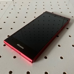 docomo 富士通アローズ赤色スマートホーン現状品/美品used品の画像