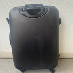 取引中　スーツケースの画像