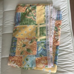 敷き布団と軽めの掛け布団の画像