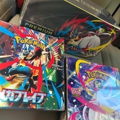 新品未開封ポケモンカードセットﾒｶﾞｼﾝﾌｫﾆｱ、ﾒｶﾞﾌﾞﾚｲﾌﾞ、ﾄﾚｰﾅｰﾎﾞｯｸｽの画像