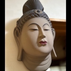 能面、 陶器の仏像  弥勒菩薩の画像