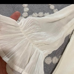 袖シースルートップスの画像