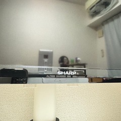 テレビスタンド付きテレビの画像