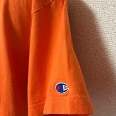 Champion Tシャツ　オレンジ色の画像