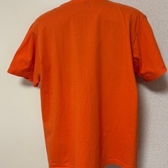 Champion Tシャツ　オレンジ色の画像
