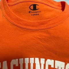 Champion Tシャツ　オレンジ色の画像