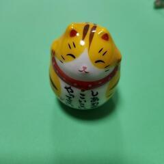 ネクタイピン&猫の置物の画像