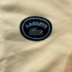 LACOSTE イエロー トレーナーの画像