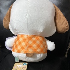 サンリオ　犬のぬいぐるみ オレンジボウタイ付きの画像