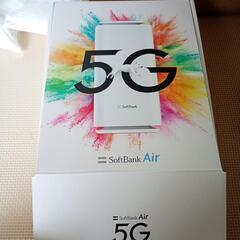 食品、DVD、紙袋、レジ袋たくさん、SoftBankAir機器の画像