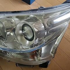 ダイハツ　ムーヴカスタム　LA100S/LA110S　ヘッドライト　前期　左右セット　HID　レベ付の画像