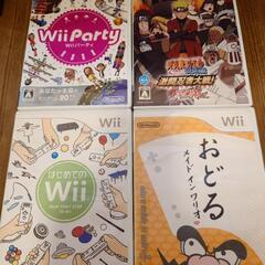 Wii本体とゲームソフト、ケーブル、コントローラーの画像