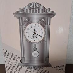 ミッキーとミニーの時計の画像