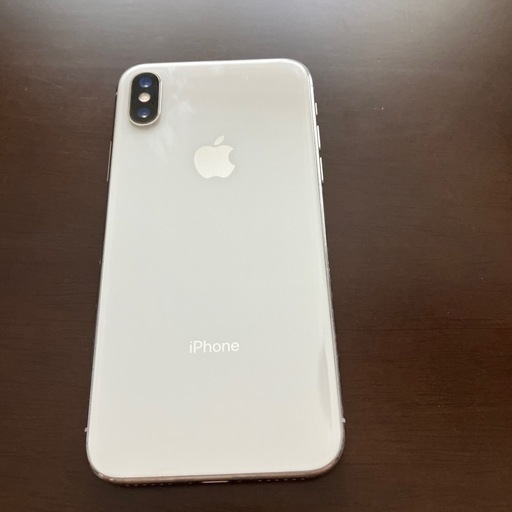 ジャンク☆iPhone X 本体 ケース付き (ベビー用品収集中) 布袋の