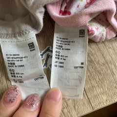 UNIQLO ボディスーツ　50.60の画像