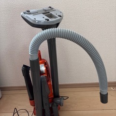 小型組立式充電式掃除機　オレンジ
の画像