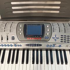 CASIO 電子キーボード(専用スタンド付き)の画像