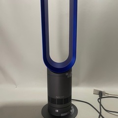 タワー型の青いデザインで、リモコン付きの冷風機の画像