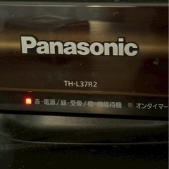 パナソニック製テレビとテレビ台の画像