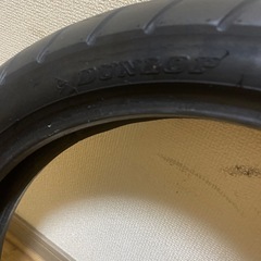 110-80-17中古タイヤひび有りの画像
