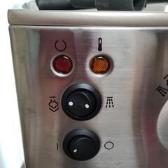 コーヒーメーカーお話中の画像
