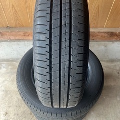 組み換え無料中古夏用タイヤ185/60R15ブリヂストンエコピアNH200cの画像