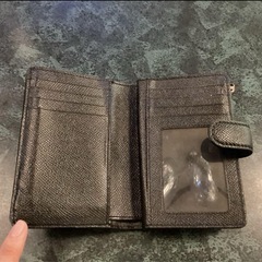 COACH 二つ折り財布 黒
の画像