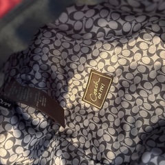 COACH ワイン色　帽子の画像