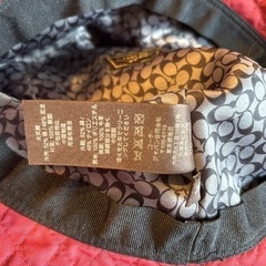 COACH ワイン色　帽子の画像